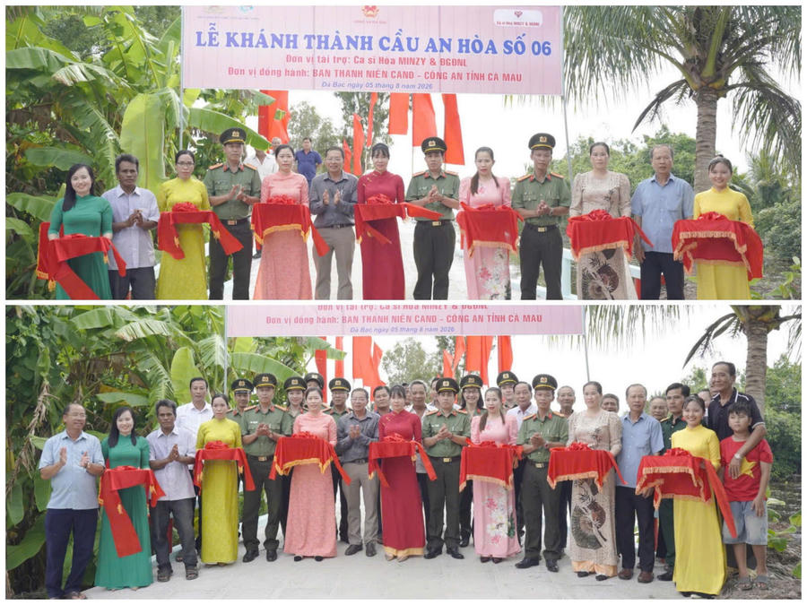 Các đại biểu thực hiện nghi thức cắt băng khánh thành cầu giao thông nông thôn An Hòa 6 và chụp ảnh lưu niệm.