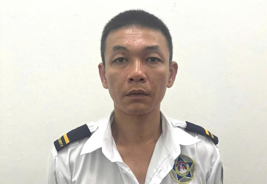 Lê Xuân Việt tại cơ quan công an.