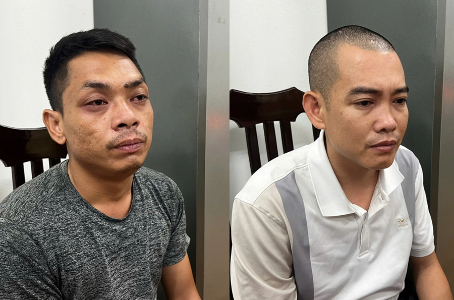 Lương (áo đen) và Đông (Ảnh: Công an Hà Nội).