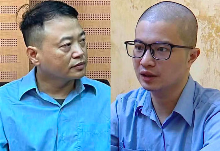 Bị cáo Nguyễn Hòa Bình và Phó Đức Nam tại cơ quan công an.