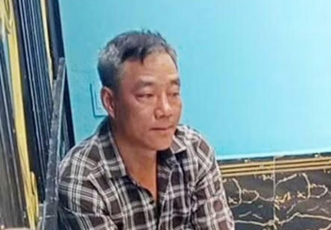 Lê Văn Gỡi tại cơ quan công an.